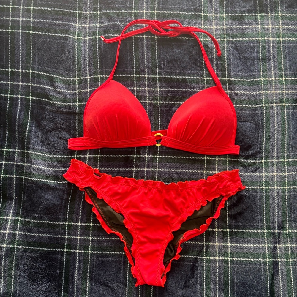 Venus Red bikini set with ruffles and gold hardware. Halter top.